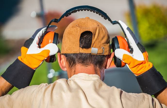Worker wearing ear protection