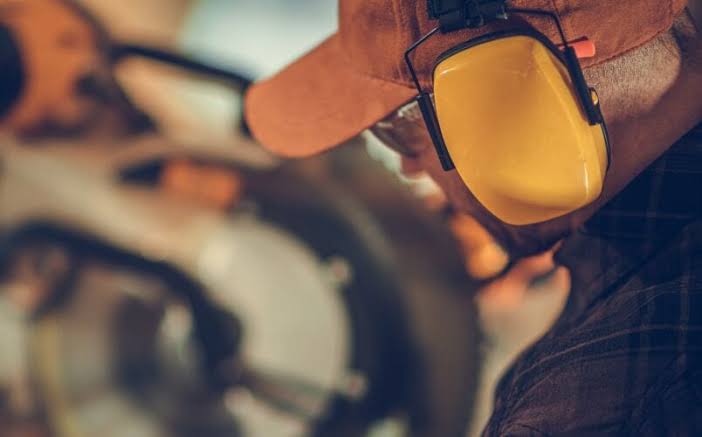 Man wearing ear protection
