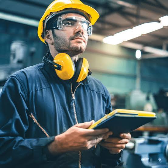 Man with ear protection looking outward