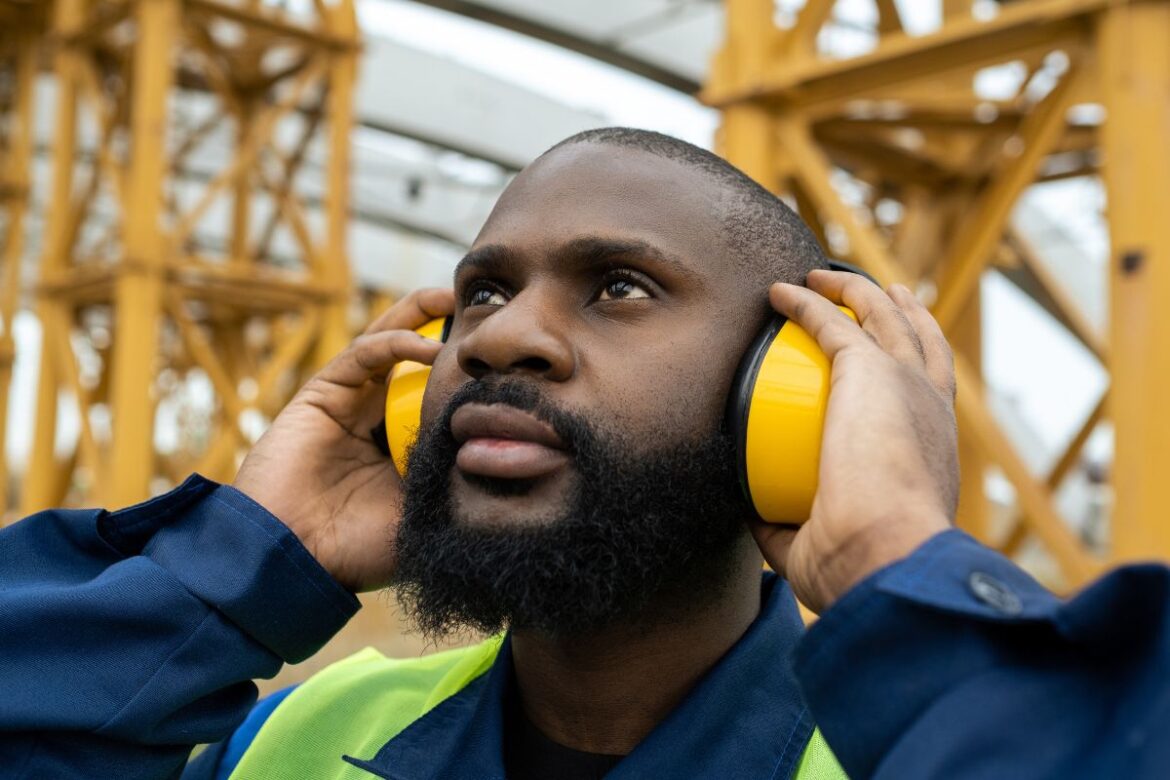 man wearing noise protection