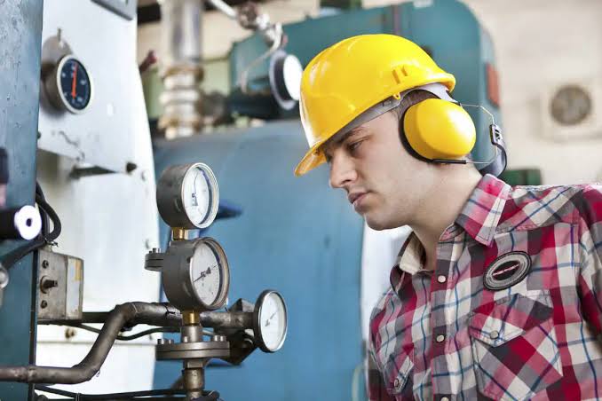 Man working with ear protections