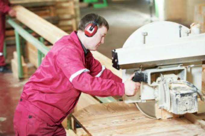 Man working in a noisy environment
