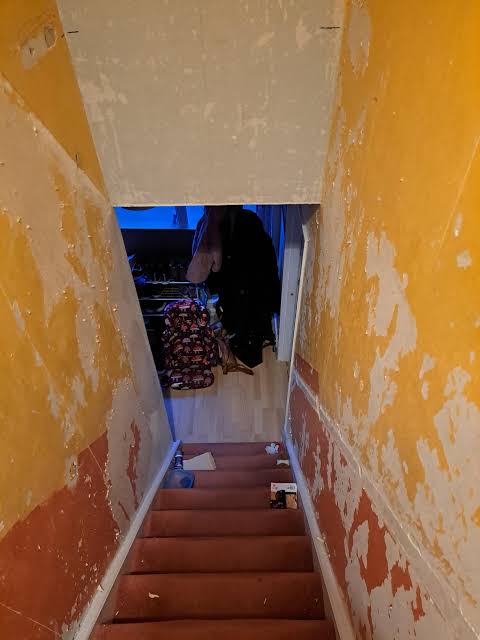 Hallway with peeling paint