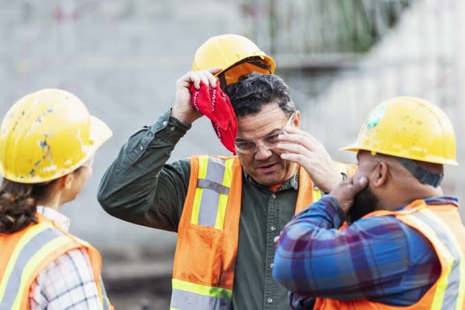 Group of workers in safety wear